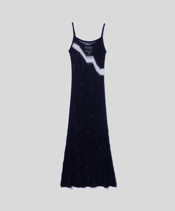 A navy open-knit sleeveless maxi dress with a hand-drawn white wave motif
