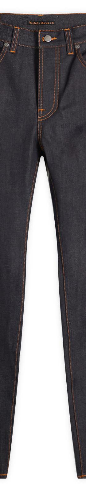 A pair of Nudie Jeans Co dry indigo selvage jeans with contrast orange stitching
