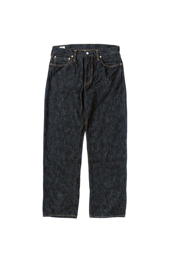 A pair of raw indigo selvedge Omoto Denim jeans on a white background