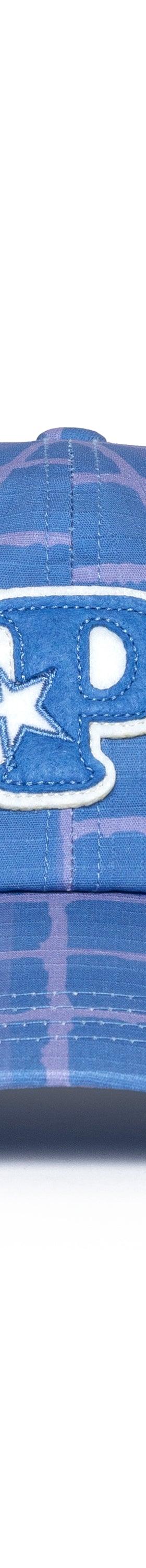 A blue checkered-print Pawa Speed Sports cap with an embroidered star logo patch