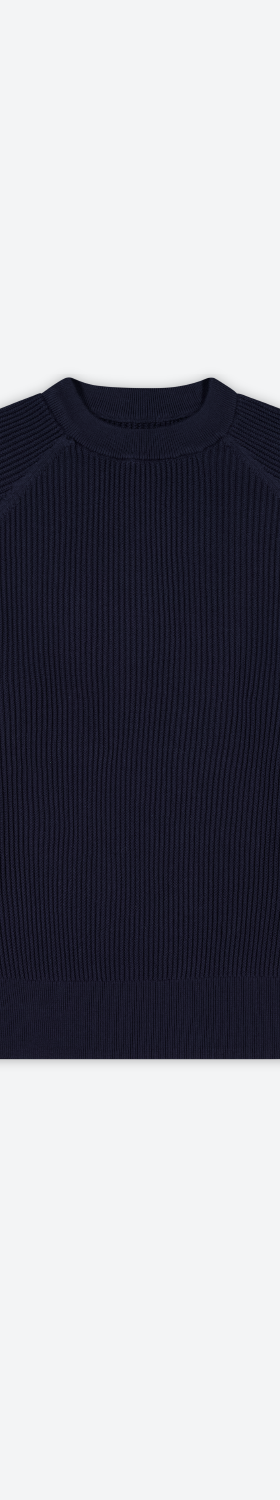 A navy ribbed raglan crewneck knit sweater on a plain background