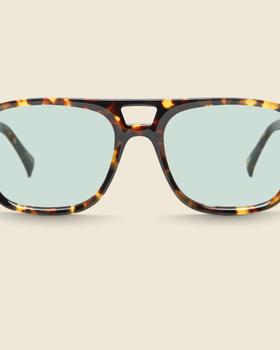 A pair of tortoiseshell acetate aviator-style RAEN sunglasses with pale green lenses