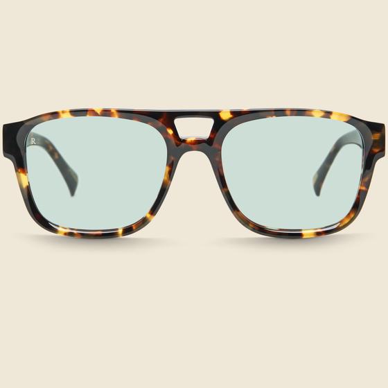 A pair of tortoiseshell acetate aviator-style RAEN sunglasses with pale green lenses