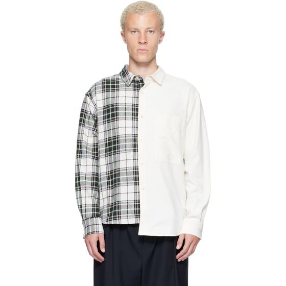 A man wearing a half-plaid, half-ivory spliced RE;CODE shirt with black trousers