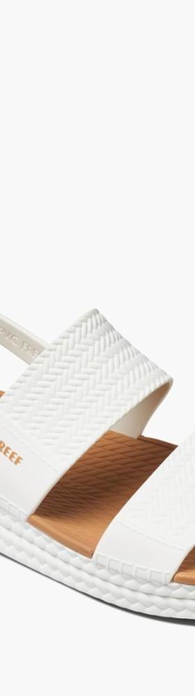 Reef white platform sandal with a tan woven footbed