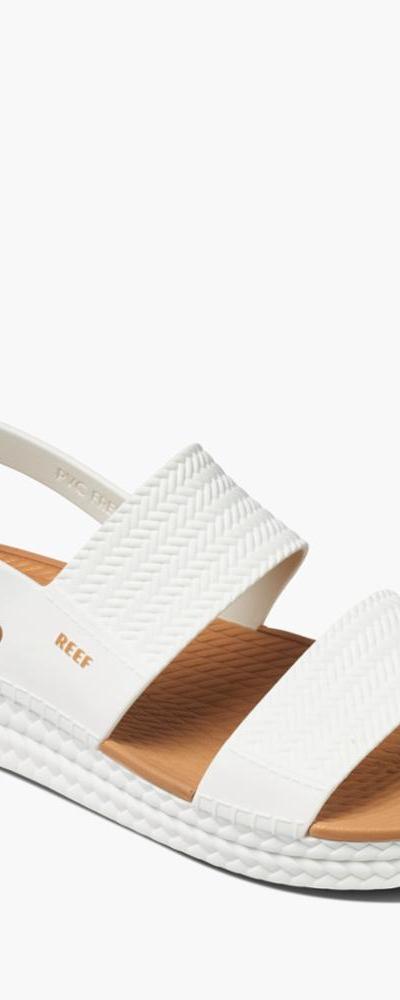 Reef white platform sandal with a tan woven footbed