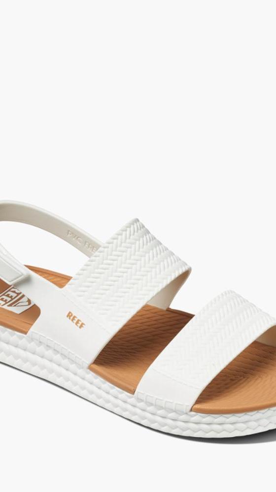 Reef white platform sandal with a tan woven footbed