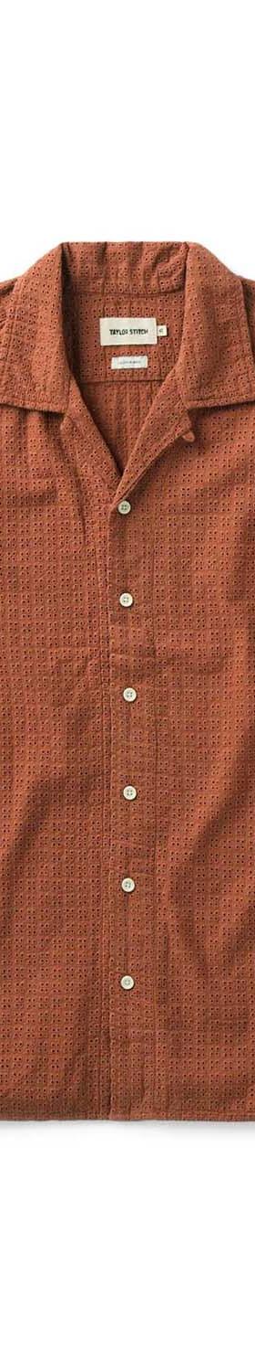 A rust-brown textured short-sleeve camp collar shirt on a plain white background