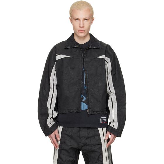 A man wearing a black Rivington Roi Rebis jacket and matching trousers