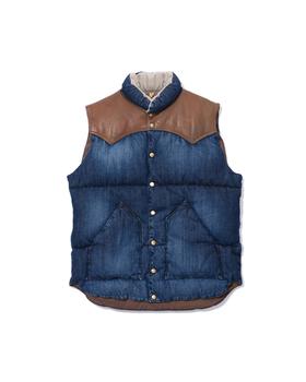 A Rocky Mountain Featherbed denim down vest with a brown leather western yoke