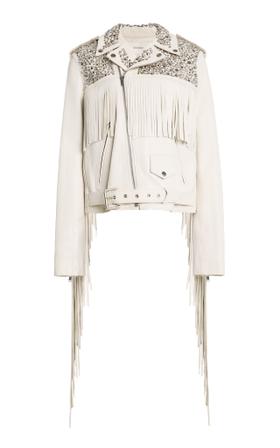 A cream fringed leather moto jacket with crystal-embellished shoulders by Rodarte