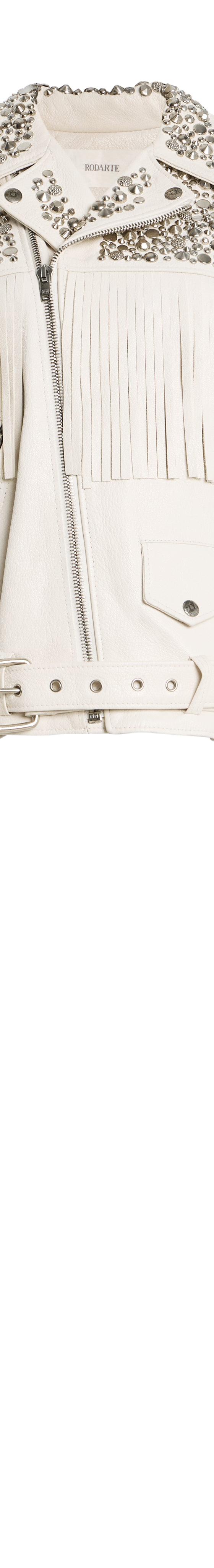 A cream fringed leather moto jacket with crystal-embellished shoulders by Rodarte