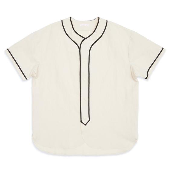 A cream s.k. manor hill baseball shirt with black piping on a plain background