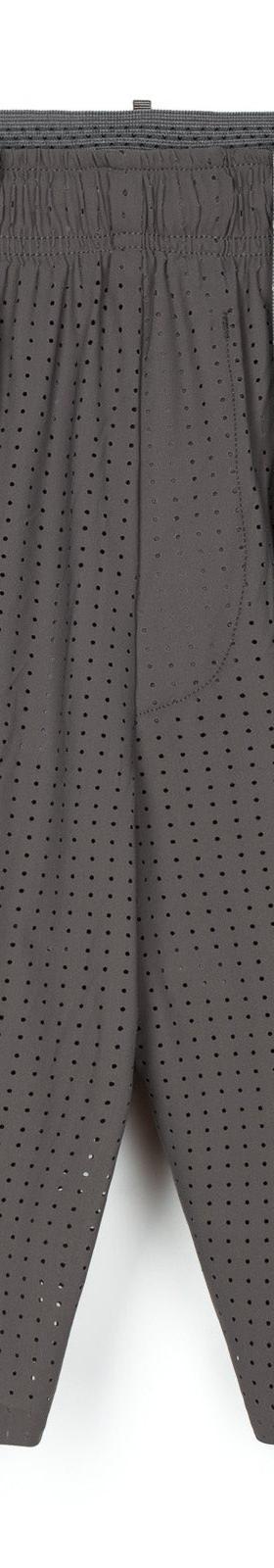 A pair of grey SATISFY perforated running shorts