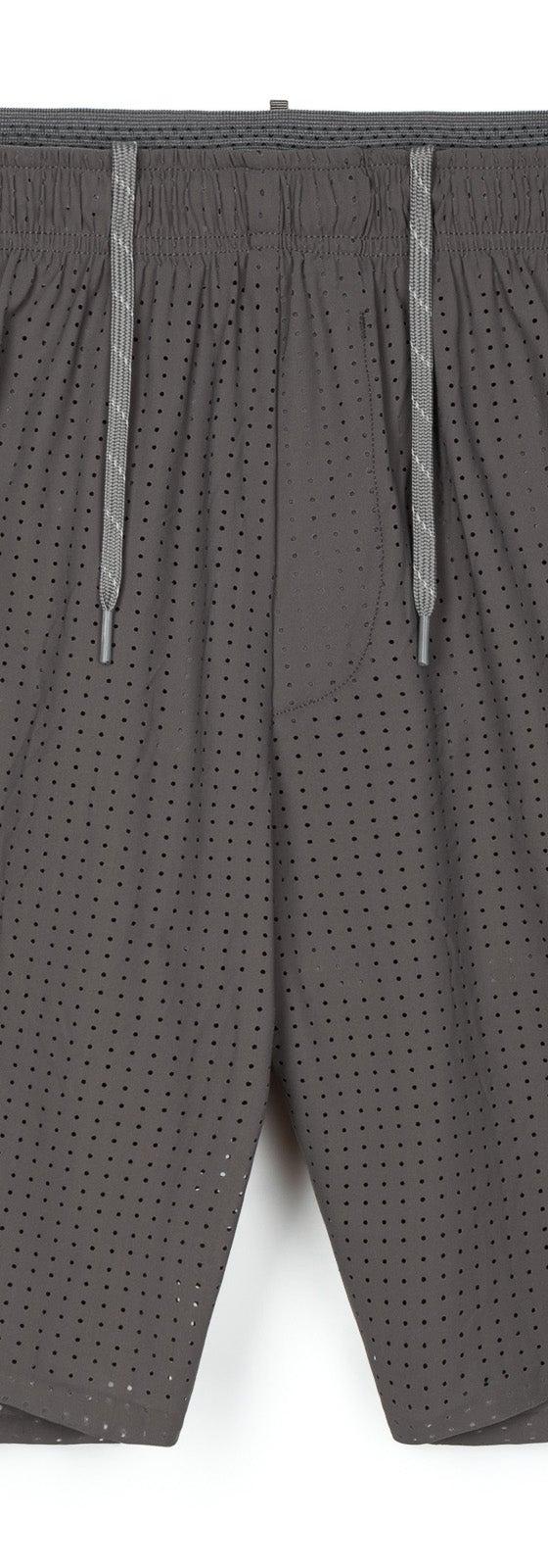 A pair of grey SATISFY perforated running shorts