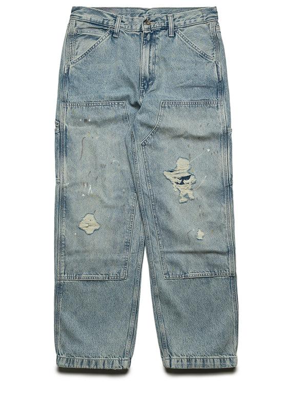 Light-wash distressed double-knee carpenter jeans on a plain white background