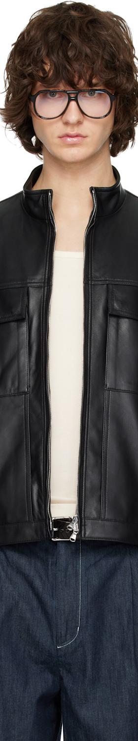 A man wearing a black leather blouson jacket by Solid Homme