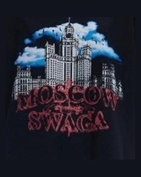 Close-up of a black SORRY, I'M NOT T-shirt printed with a Moscow skyscraper, blue clouds and MOSCOW SWAGA lettering