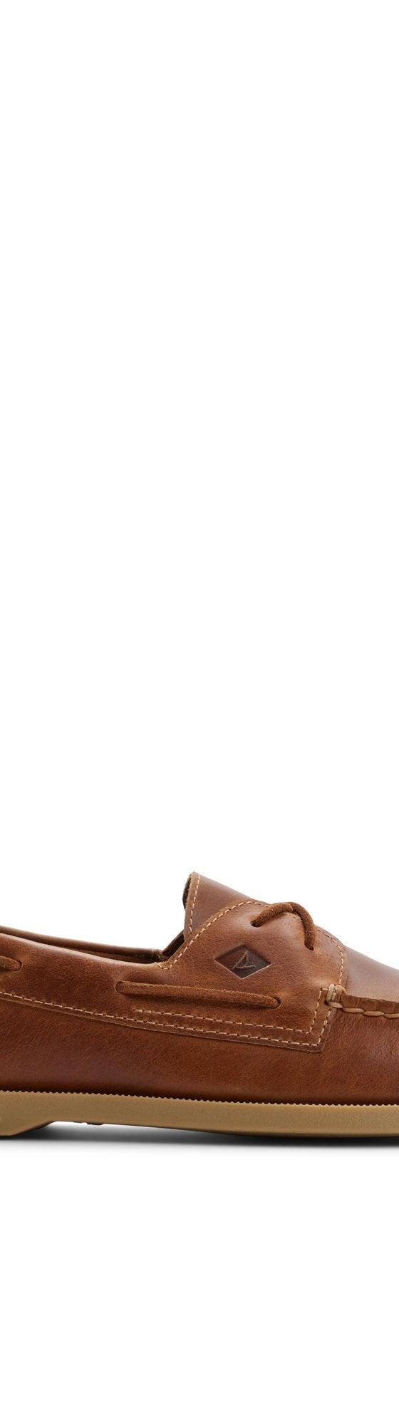 A tan leather Sperry Authentic Original two-eye boat shoe with gum sole