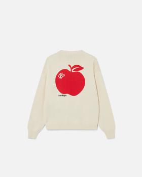 A cream Sundays knitted sweater with a red apple motif on the back