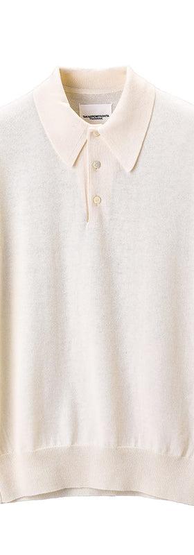 An ivory short-sleeve knit polo shirt on a plain white background