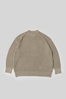 A beige ribbed mock-neck knit sweater by THE DAY