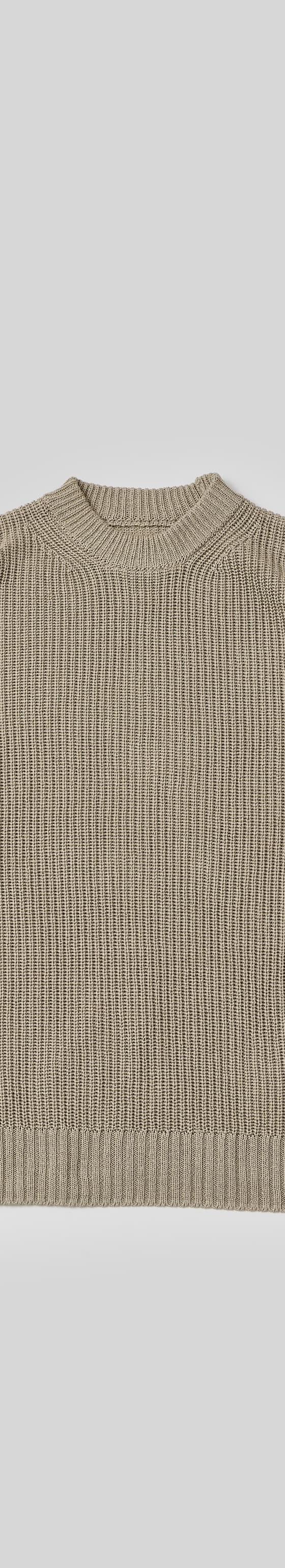 A beige ribbed mock-neck knit sweater by THE DAY
