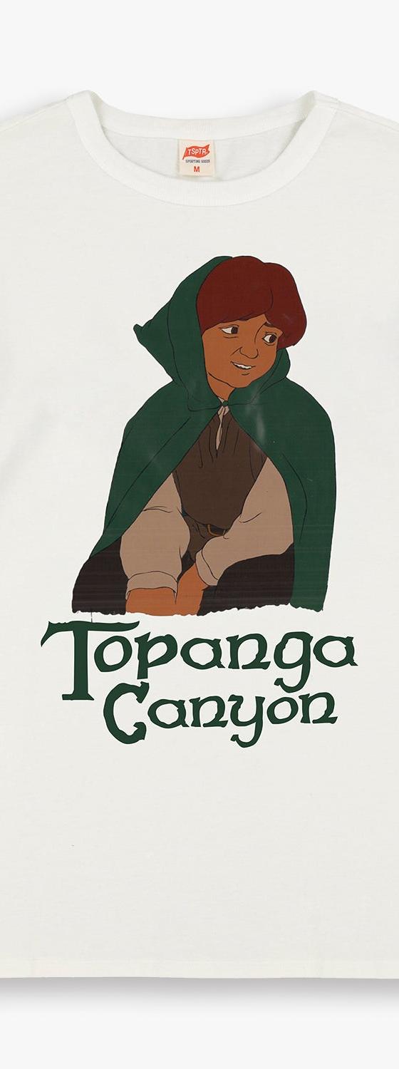A TSPTR cream and green raglan long-sleeve tee with a printed graphic
