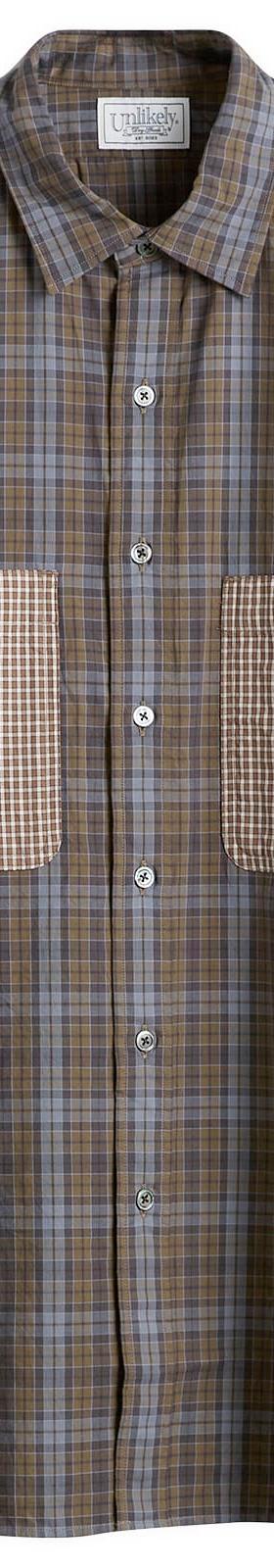 A patchwork check cotton shirt with contrast houndstooth pockets and sleeve by Unlikely Dry Goods