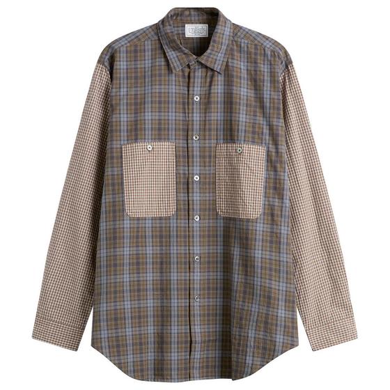 A patchwork check cotton shirt with contrast houndstooth pockets and sleeve by Unlikely Dry Goods