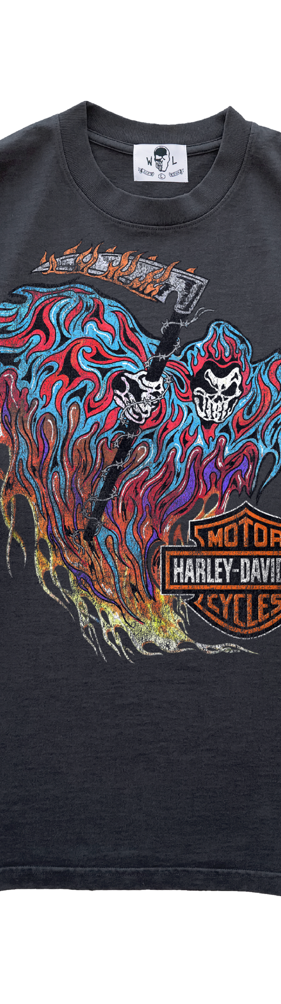 A faded black Warren Lotas t-shirt with a skull-and-flames graphic print