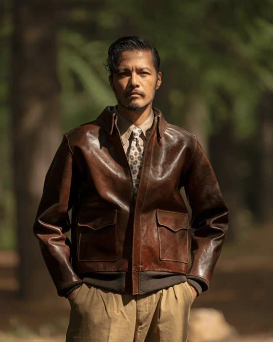 A man wearing a brown Y'2 Leather horsehide flight jacket