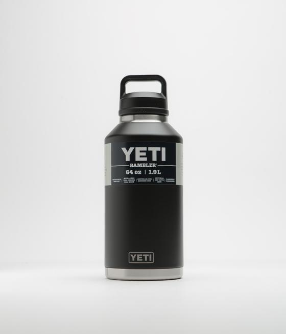 A black YETI Rambler 64oz insulated bottle with chug cap