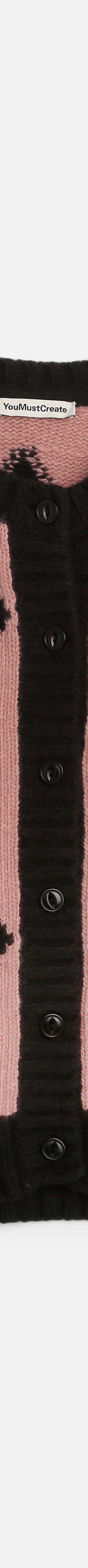 A pink and black diamond-patterned YMC knitted cardigan on a plain white background
