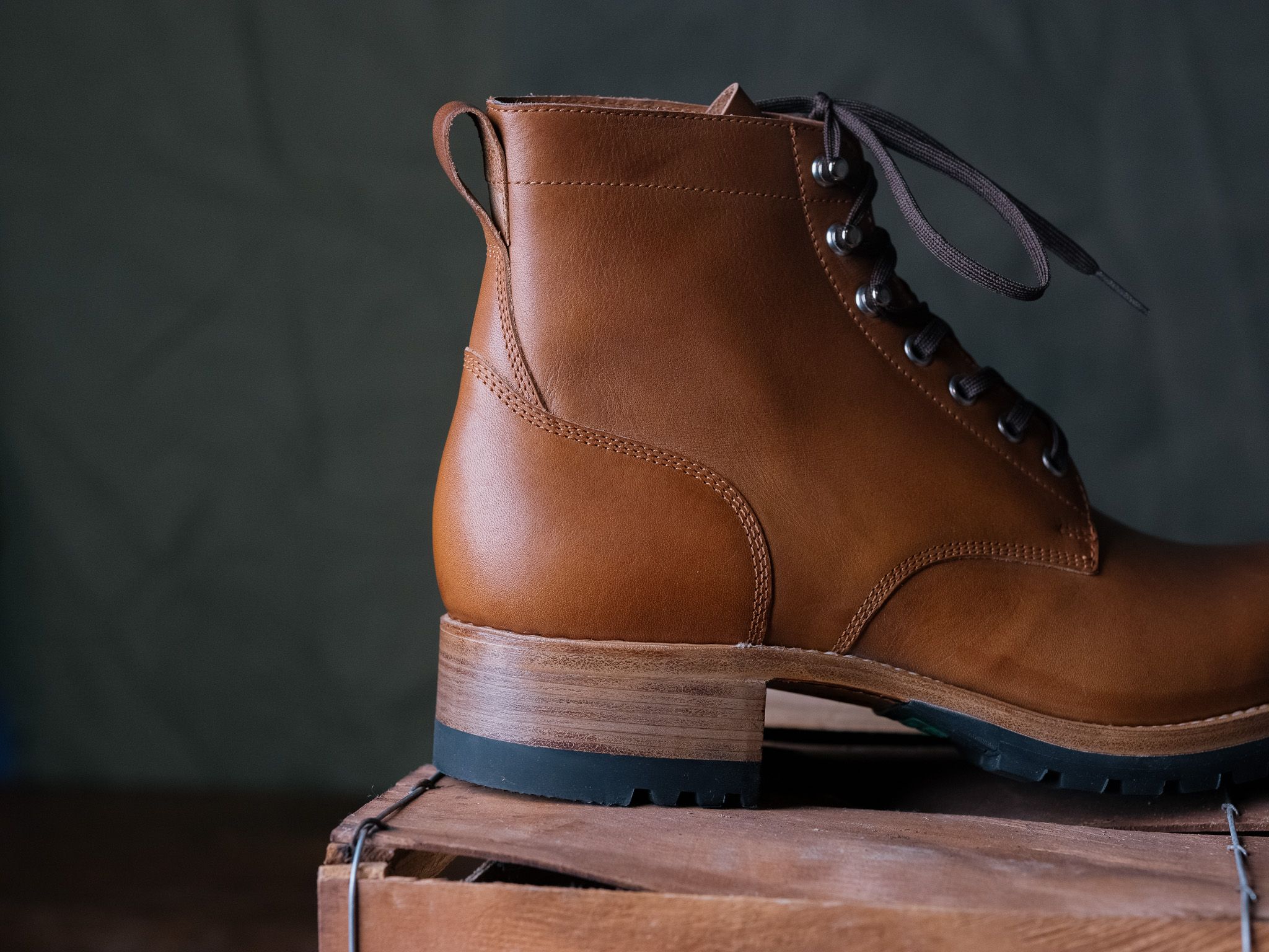 Close-up of the heel of a Saddleback Huntsman boot in Natural leather, showing the stacked leather heel and rubber top lift