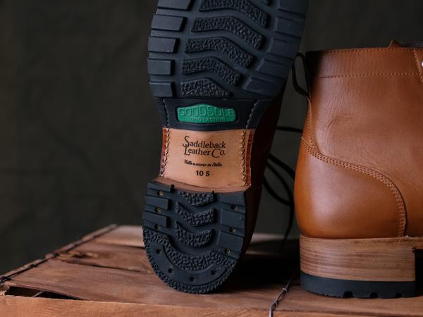 The underside of a Saddleback Huntsman boot showing the tread and Saddleback's stamp