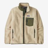 A Patagonia Classic Retro-X jacket in cream sherpa pile fleece, shown flat from the front with no wearer. It has an olive green collar lining, binding, and chest pocket, dark green zipper pulls, and a Patagonia logo patch, on a near-white background.