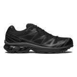 A single black Salomon XT-6 GORE-TEX trail running shoe in Black / Black / Asphalt, shown in side profile on a white background, with dark grey SensiFit overlays, quicklace system and a chunky lugged sole.