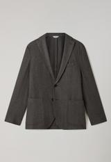 A men's taupe herringbone wool two-button jacket laid flat on a plain grey background, buttoned, with notch lapels, a chest welt pocket and two patch pockets.