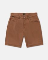 A pair of RVCA Dayshift 5 Pocket 21in shorts in Rawhide tan-brown cotton twill, laid flat in a front view on a white background, with a copper shank button, copper rivets, a black RVCA label at the inside back waistband and a small RVCA tab on the coin pocket.